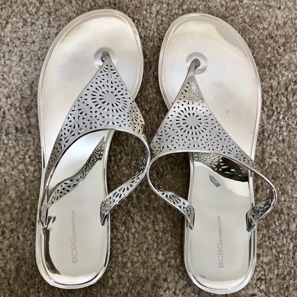 BCBGeneration Shiny Silver flip flops / sandals.